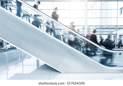 trade fair staircase with blurred people - Powered by Shutterstock