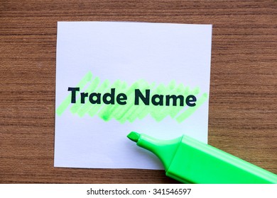 Trade Name Word Highlighted On The White Paper