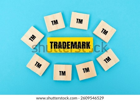 TRADEMARK concept with blocks in creative flat lay design