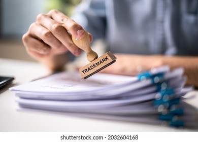 Trademark Protection Rubber Stamp On Paper In Office