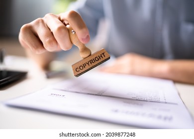 Trademark Protection Rubber Stamp On Paper In Office
