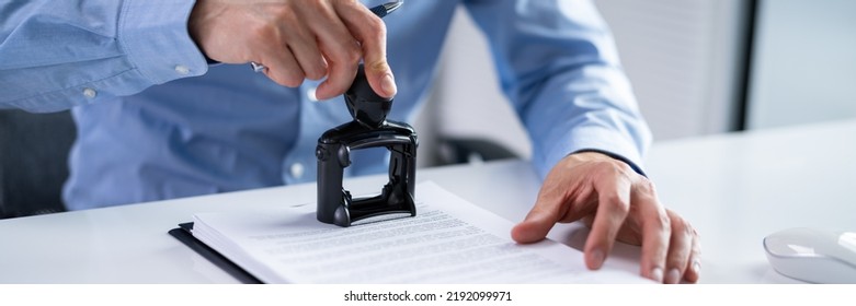 Trademark Protection Rubber Stamp On Paper In Office