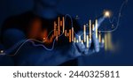 Trader analyzing data on virtual screen.Price graph and indicator. Stock market invest and crypto currency. Stock market and business investment.
