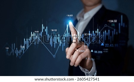 Trader analyzing data on virtual screen.Price graph and indicator. Stock market invest and crypto currency. Stock market and business investment.	