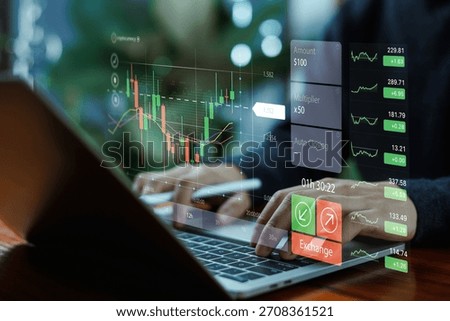 A trader using a laptop with digital candlestick charts and real-time market analytics, symbolizing online trading, financial analysis, investment strategies, and modern fintech technology.