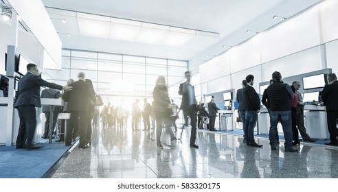 Tradeshow Visitors At Trade Fair Stands