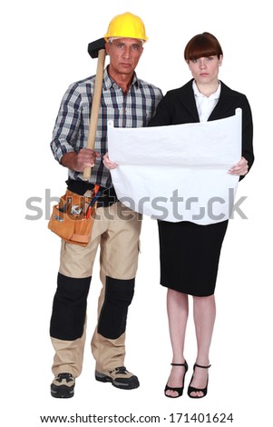 Tradesman and engineer working together