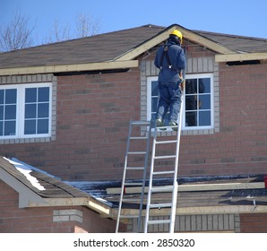 Tradesperson Working On A New Home.