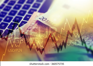 Trading Markets. Forex Currency Trading Concept With Computer, Cash Euro Money And Some Line Graph Statistics.