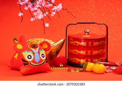 Tradition Chinese cloth doll tiger,2022 is year of the tiger,Chinese characters on 
 tiger mean:good bless for year of the tiger,word on golden coin mean:good luck for money - Shutterstock ID 2079201583