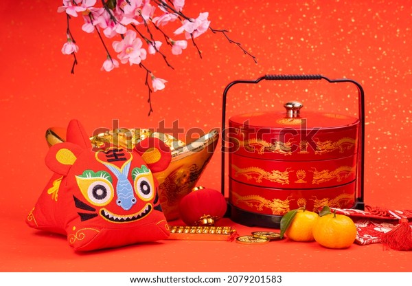Tradition Chinese\
cloth doll tiger,2022 is year of the tiger,Chinese characters on \
\
tiger mean:good bless for year of the tiger,word on golden coin\
mean:good luck for\
money