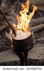 Traditional African Cashew Roasting - Old Can With Huge Flames