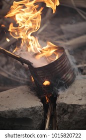 Traditional African Cashew Roasting - Old Can With Huge Flames