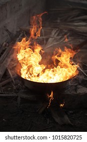 Traditional African Cashew Roasting - Old Can With Huge Flames