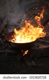 Traditional African Cashew Roasting - Old Can With Huge Flames