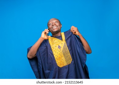 Traditional African man using mobile phone for the first time to receiving and make calls - Powered by Shutterstock