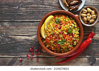 Traditional African, Middle Easter
  Or Mediterranean Bulgur Salad With Vegetables, Herbs And Spices. 