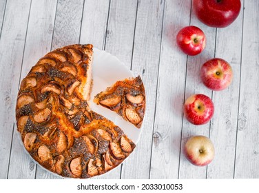 Traditional American Apple Pie With Poppy Seeds And Fruits Slices Garnish Decor. Autumn Seasonal Sweet Bakery. Festive Thanksgiving Apple Cake Recipe .