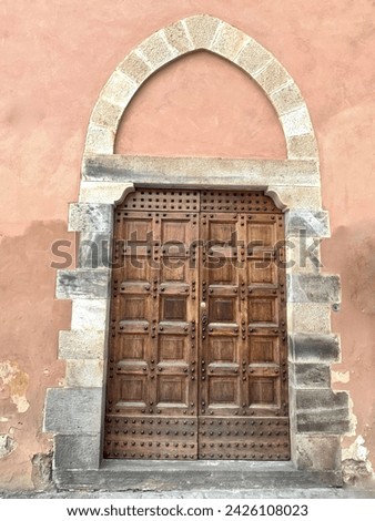 Traditional antique portals and doors of Tuscany: Florence and Pisa.