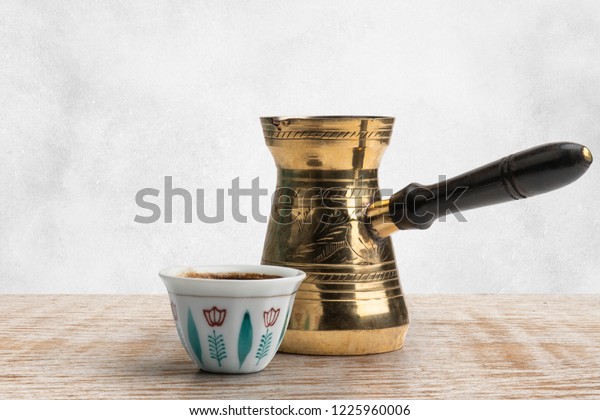 Traditional Arabic Coffee Mug\
and Coffee Cup, Turkish Coffee isolated on white, Clipping path\
Included\
