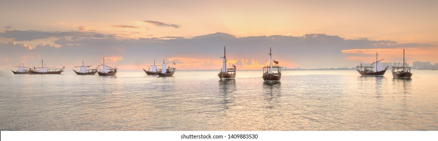 Traditional Arabic Dhow Boats In Doha Harbour, Qatar.