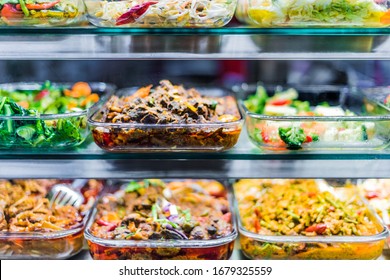 Traditional Asian Dishes Sold In A Shopping Mall Food Court In Singapore