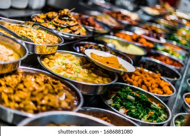 Traditional Asian Dishes Sold In A Shopping Mall Food Court In Singapore.