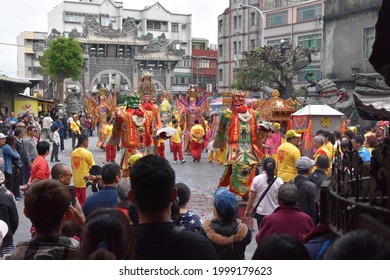 Traditional Asian Festival Parade With Colorful Costumes, Masquerade, Dance Performance In Religious Celebration Ceremony At Taiwanese Hotsu Longfong Temple, Miaoli City, Taiwan, Asia. April 15, 2018.