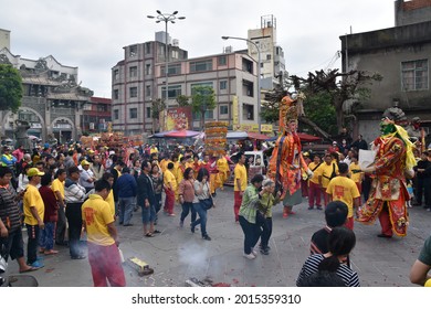 Traditional Asian Festival Parade With Colorful Costumes, Masquerade, Dance Performance In Religious Celebration Ceremony At Taiwanese Hotsu Longfong Temple, Miaoli City, Taiwan, Asia. April 15, 2018.