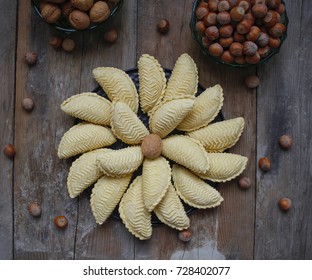 Traditional Azerbaijan Holiday Nowruz Cookies On Black Plate On The Rustic Background With Nuts And Huzelnuts On Green Plate ,flat Lay