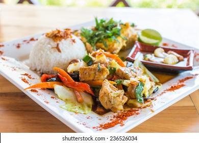 Traditional Balinese Cuisine. Vegetable And Chicken Stir-fry With Rice.