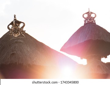 Traditional balinese roofs in Hindu temple with ray of light background