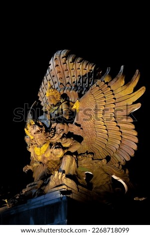 Traditional Balinese stone sculpture art and culture known by Miniature Garuda Wisnu Kencana at Bali, Indonesia
form of Batara Wisnu riding the legendary Garuda as a symbol of Amerta, eternal goodness