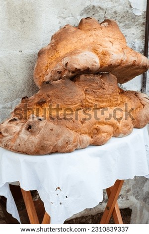 Traditional Basilicata Italy Pane di Matera bread – huge loaf with a hard, dark brown crust and pale yellow crumb