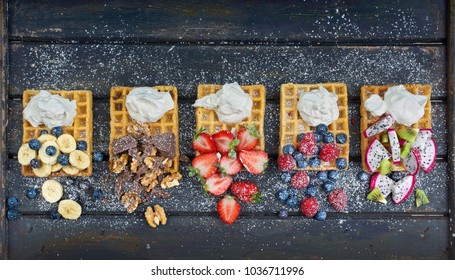 Traditional belgian waffles with fresh fruit and whipped cream