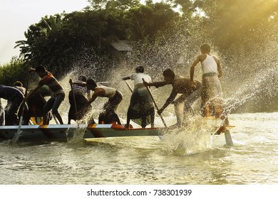 Traditional boat racing sport by the Bengali village people, Nikli, Bangladesh, 2013. A landscape closeup view of Bangladeshi local boat race competition ai Kishoreganj, Bangladesh. 