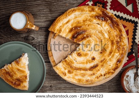 Traditional Bosnian and Turkish meal made from rolled pastry filled with spinach. In Turkey it is called Borek with cheese. In Bosnia this dish is called Pita Sirnica. Made from phyllo pastry.