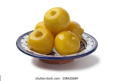 Traditional Bowl With Moroccan Preserved Lemons Isolated On White Background