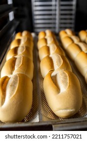 traditional Brazilian bread, known as "French bread". Industrial production of French bread - Shutterstock ID 2211757021