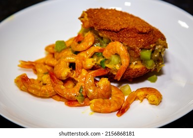 Traditional Brazilian Acarajé, Food Of African Origin Based On Vatapá, Caruru And Dry Shrimp On The White Plate