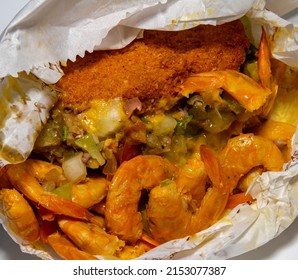 Traditional Brazilian Acarajé With Vatapá, Carurú And Shrimp. Typical Bahian Food Close-up