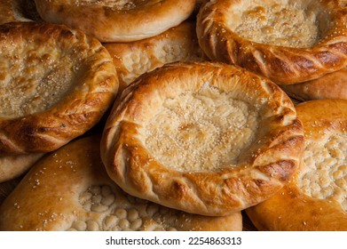 Traditional bread in Central Asia. Tandoor flatbread. Bread cakes. Traditional Uzbek the pellets. - Shutterstock ID 2254863313