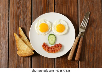 Traditional Breakfast - Eggs, Bacon, Toast And Vegetables, Fruit