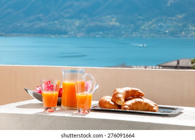 Traditional Breakfast On The Balcony Of A House, Lake View