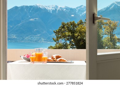 Traditional Breakfast On The Balcony Of A House, Lake View