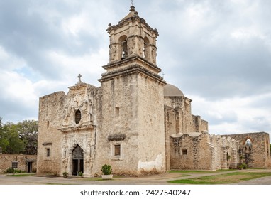 Traditional brick architecture of the old Mission San Jose located at the San Antonio Mission Historical park in San Antonio Texas. Picture is taken on a cloudy overcast day - Powered by Shutterstock