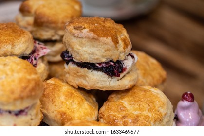 Traditional British Scones With Clotted Cream And Rasberry Jam