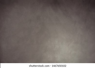 Traditional brown painted muslin or canvas fabric cloth studio background or backdrop