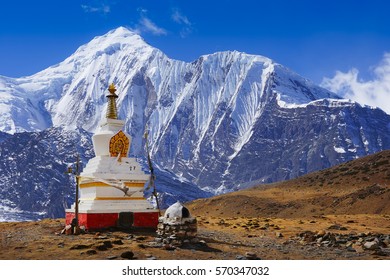 Traditional Buddhist Stupa At Annapurna Circuit Trek With White Summit View, Himalaya Mountains, Nepal, Asia. For Horizontal Postcard Or Calendar.