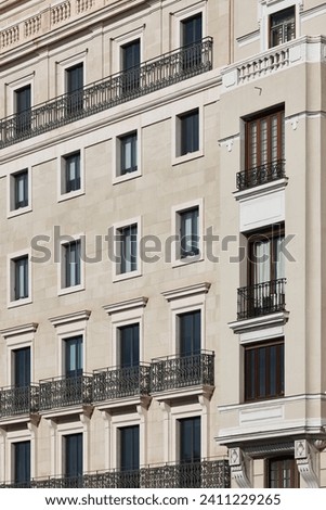 Traditional building facade in Madrid city center. Classic style. Spain